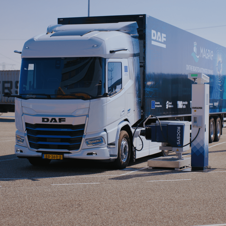 Apmt Rocsys DAF electric truck charged with ROCSYS automated charging system in the ...